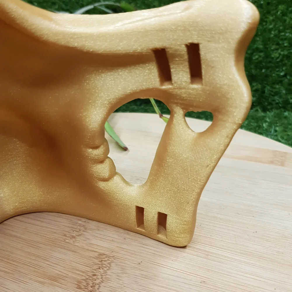 3D-printed Higgs Mask from Death Stranding in gold or black ABS. Durable and wearable for cosplay or display.