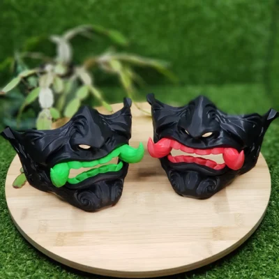 Elevate your style with this wearable 3D-printed Japanese Oni mask, made from durable black, green or red ABS for a bold,