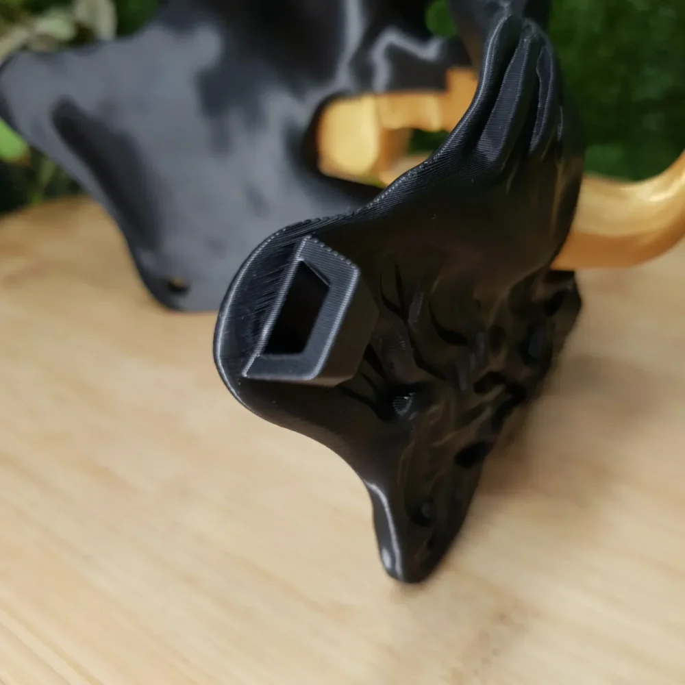 Elevate your style with this wearable 3D printed Japanese Oni mask, made from durable black and gold ABS for a bold,
