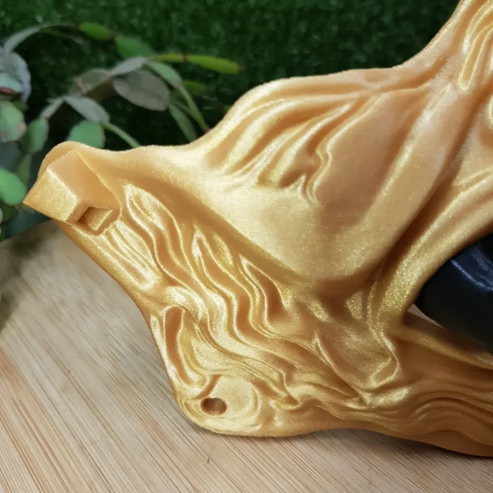 Elevate your style with this wearable 3D printed Japanese Oni mask, made from durable black and gold ABS for a bold,